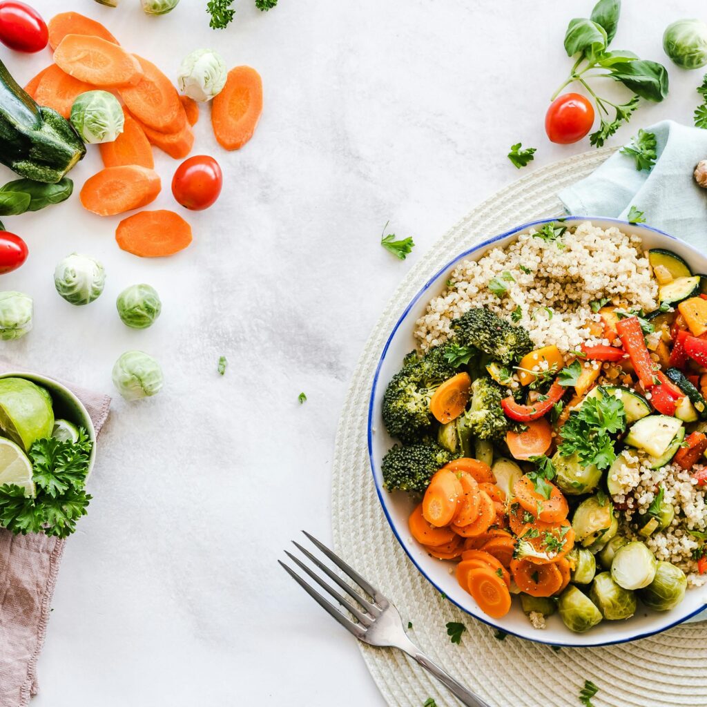 Colorful quinoa salad with fresh vegetables creates a healthy, balanced meal.